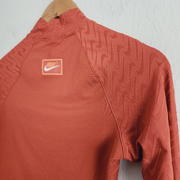 Nike Icon Clash Logo Print Mock-Neck Long Sleeve Top Terracotta Burnt Orange XS - Picture 12 of 12